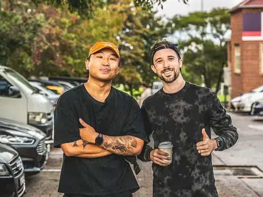 two people smiling having a coffee