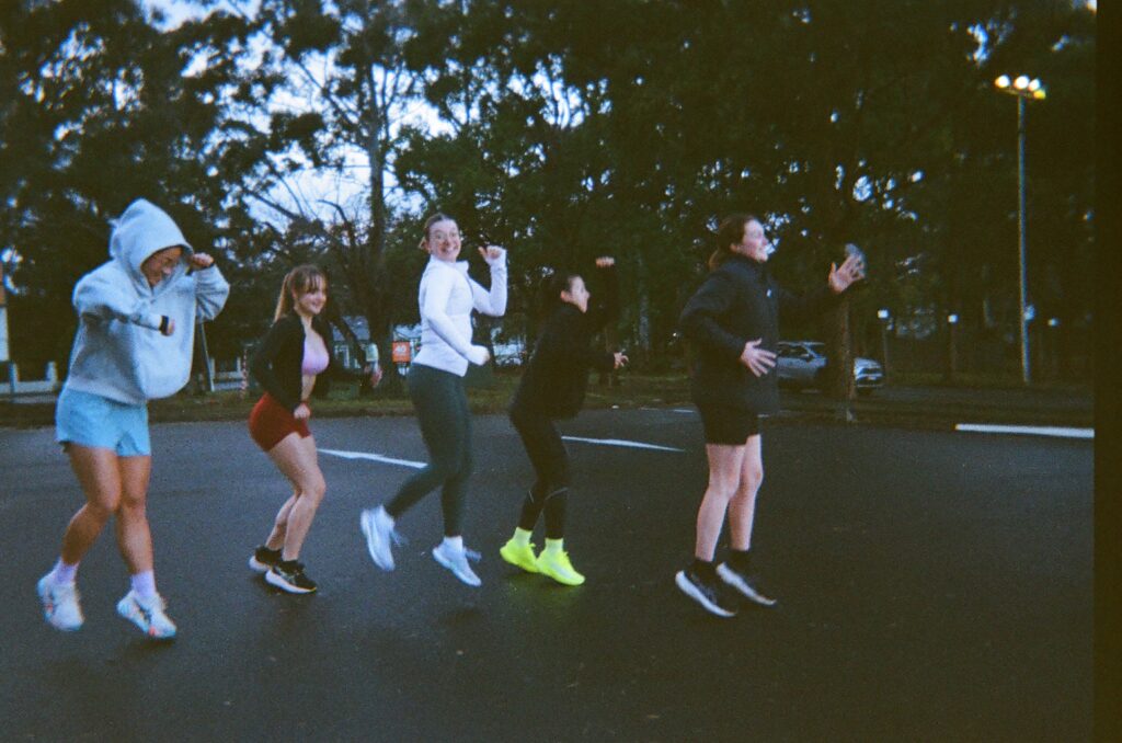 Hills Run Club members in club colours at a community run